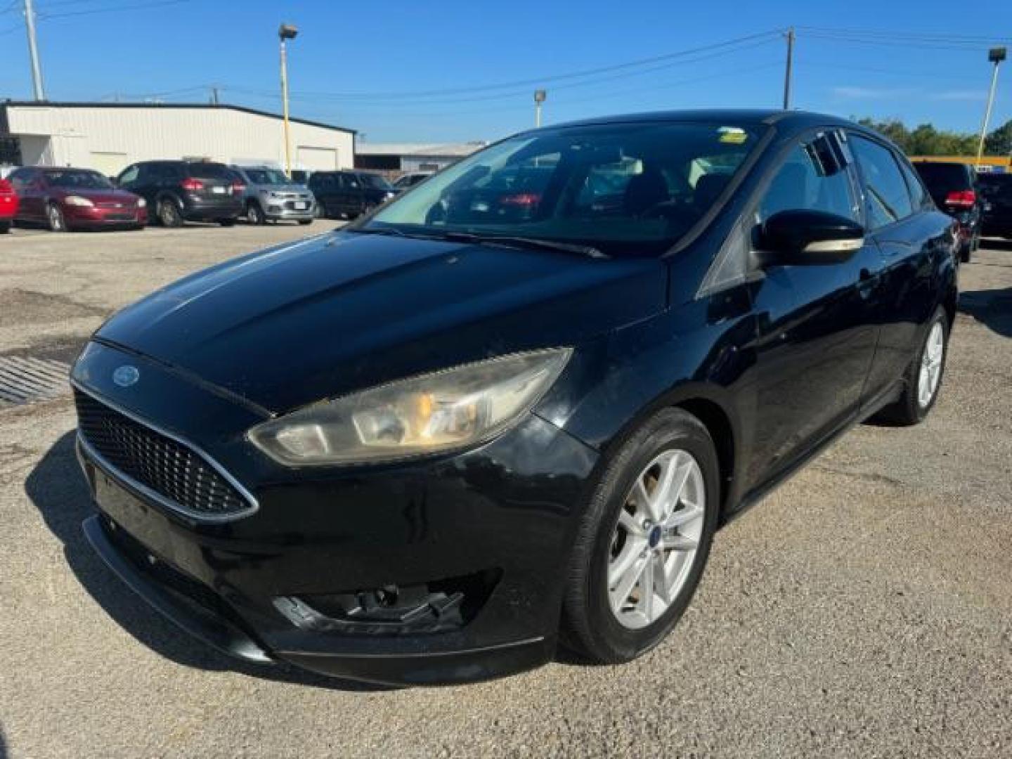 2017 BLACK Ford Focus SE Sedan (1FADP3F24HL) with an 2.0L L4 DOHC 16V engine, located at 2715 W Pioneer Pkwy, Arlington, TX, 76013, (817) 265-9009, 32.710262, -97.153236 - Photo#2