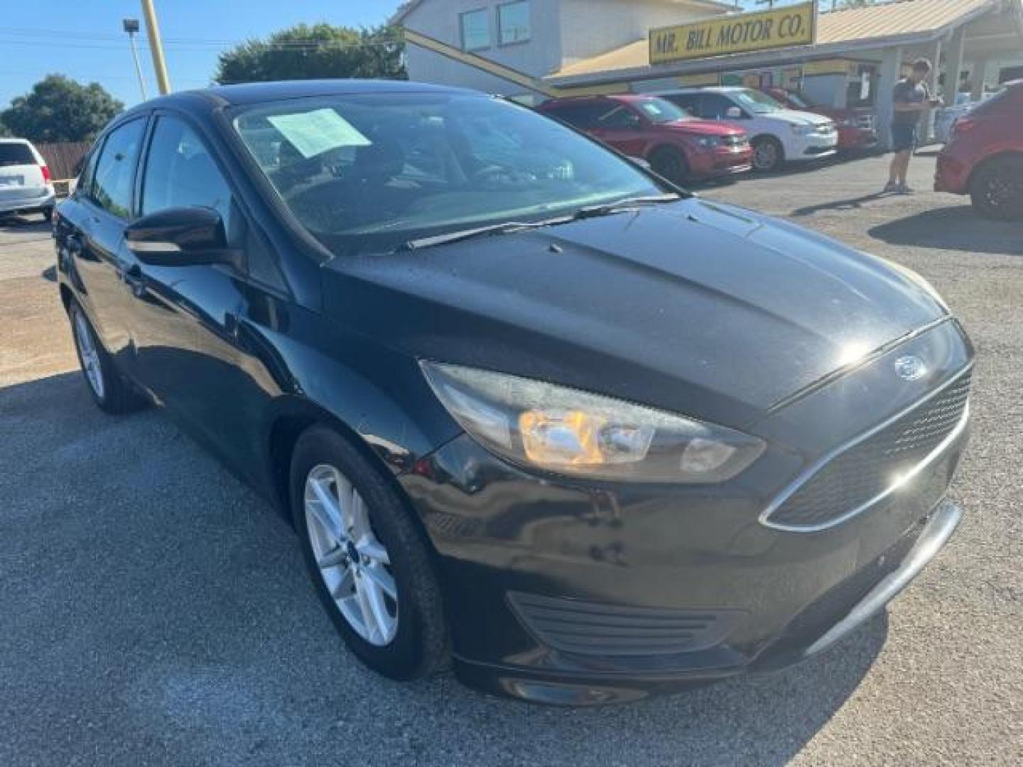 2017 BLACK Ford Focus SE Sedan (1FADP3F24HL) with an 2.0L L4 DOHC 16V engine, located at 2715 W Pioneer Pkwy, Arlington, TX, 76013, (817) 265-9009, 32.710262, -97.153236 - Photo#4