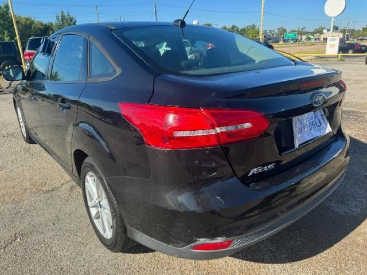 2017 BLACK Ford Focus SE Sedan (1FADP3F24HL) with an 2.0L L4 DOHC 16V engine, located at 2715 W Pioneer Pkwy, Arlington, TX, 76013, (817) 265-9009, 32.710262, -97.153236 - Photo#7