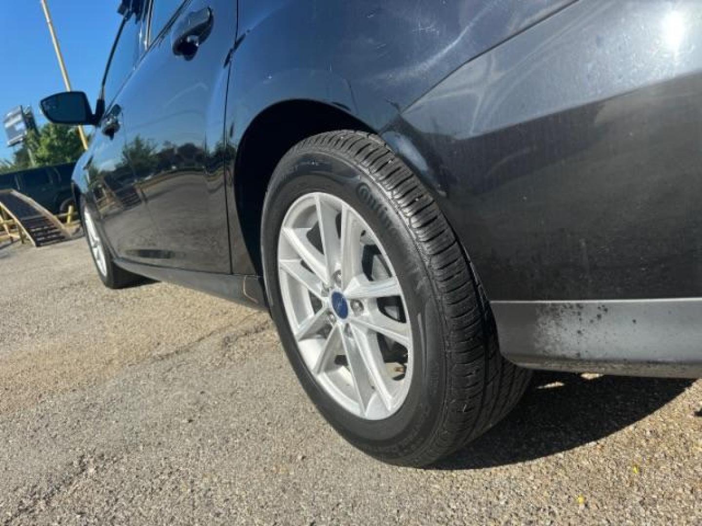 2017 BLACK Ford Focus SE Sedan (1FADP3F24HL) with an 2.0L L4 DOHC 16V engine, located at 2715 W Pioneer Pkwy, Arlington, TX, 76013, (817) 265-9009, 32.710262, -97.153236 - Photo#8