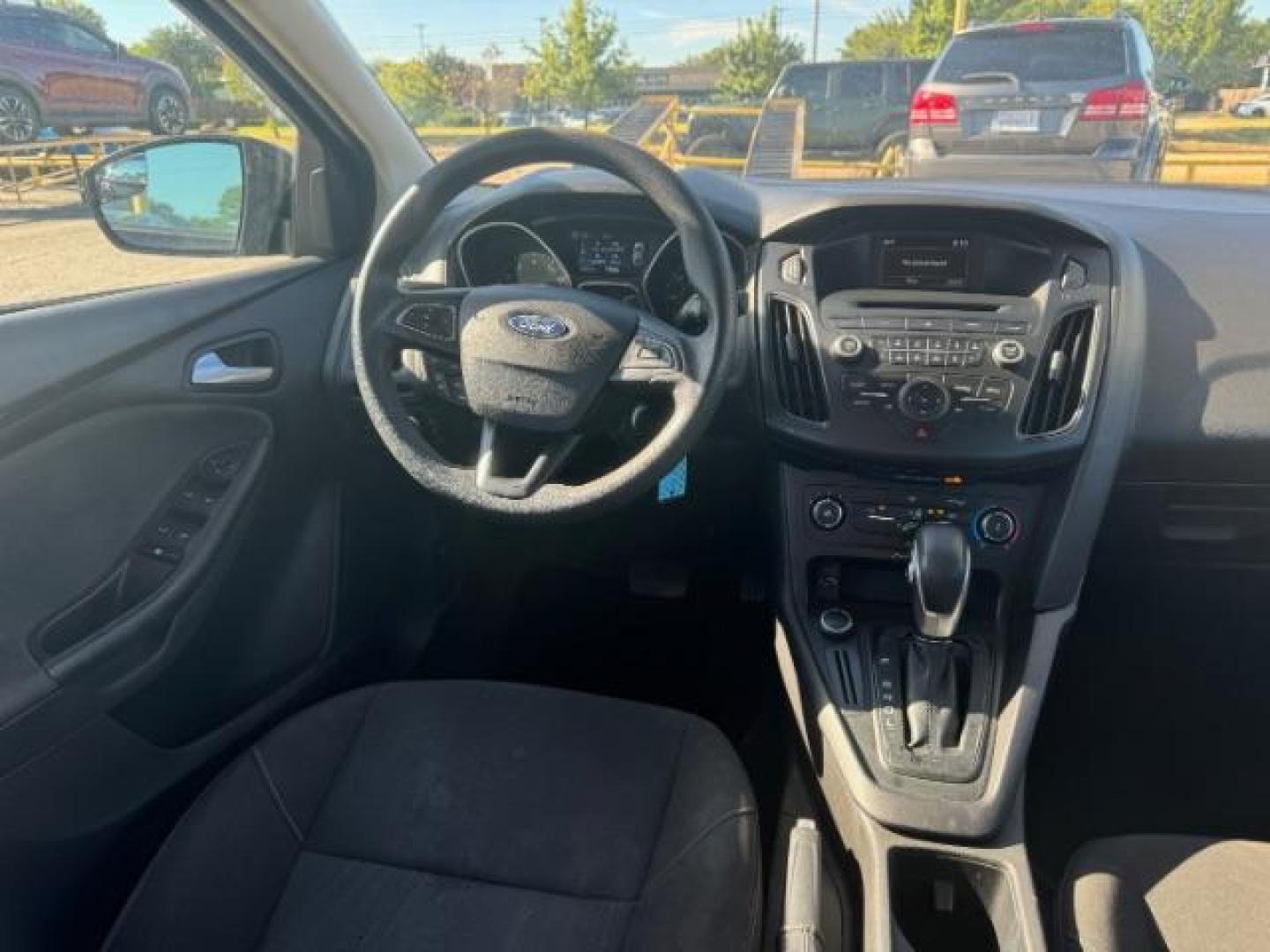 2017 BLACK Ford Focus SE Sedan (1FADP3F24HL) with an 2.0L L4 DOHC 16V engine, located at 2715 W Pioneer Pkwy, Arlington, TX, 76013, (817) 265-9009, 32.710262, -97.153236 - Photo#12
