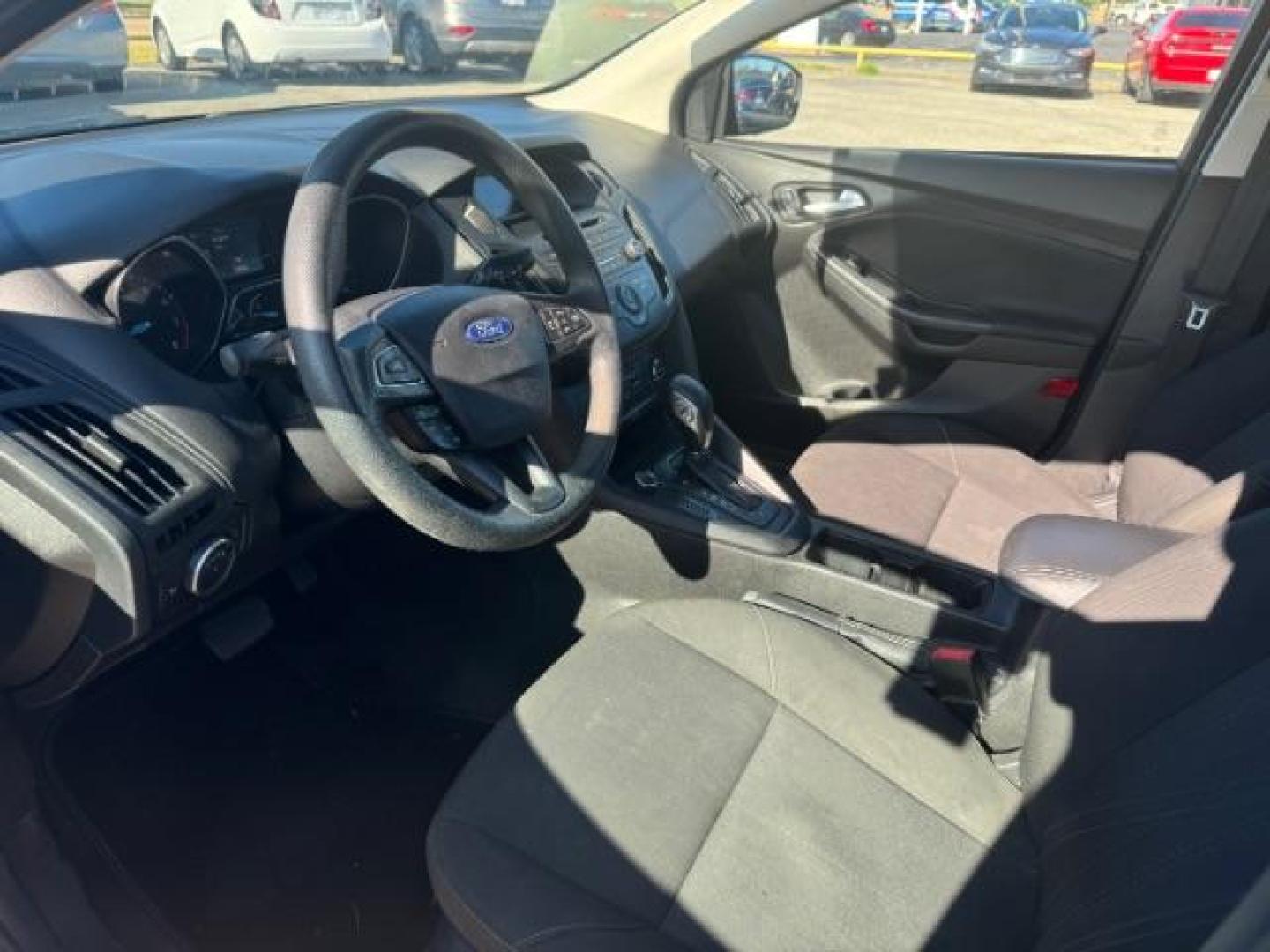 2017 BLACK Ford Focus SE Sedan (1FADP3F24HL) with an 2.0L L4 DOHC 16V engine, located at 2715 W Pioneer Pkwy, Arlington, TX, 76013, (817) 265-9009, 32.710262, -97.153236 - Photo#14