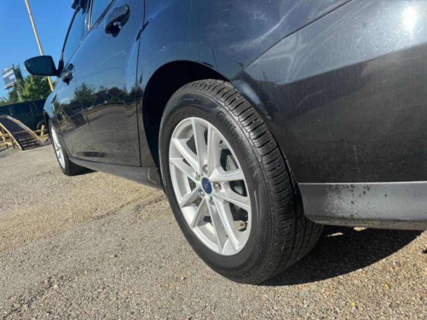 2017 BLACK Ford Focus SE Sedan (1FADP3F24HL) with an 2.0L L4 DOHC 16V engine, located at 2715 W Pioneer Pkwy, Arlington, TX, 76013, (817) 265-9009, 32.710262, -97.153236 - Photo#9