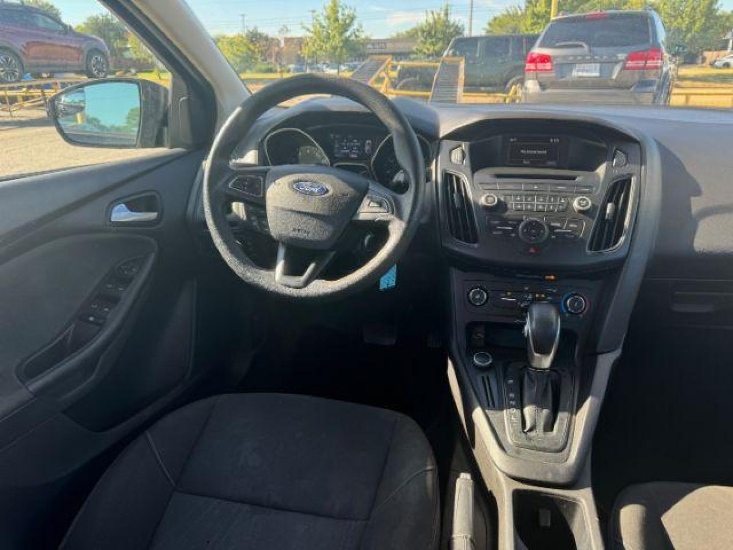 2017 BLACK Ford Focus SE Sedan (1FADP3F24HL) with an 2.0L L4 DOHC 16V engine, located at 2715 W Pioneer Pkwy, Arlington, TX, 76013, (817) 265-9009, 32.710262, -97.153236 - Photo#13
