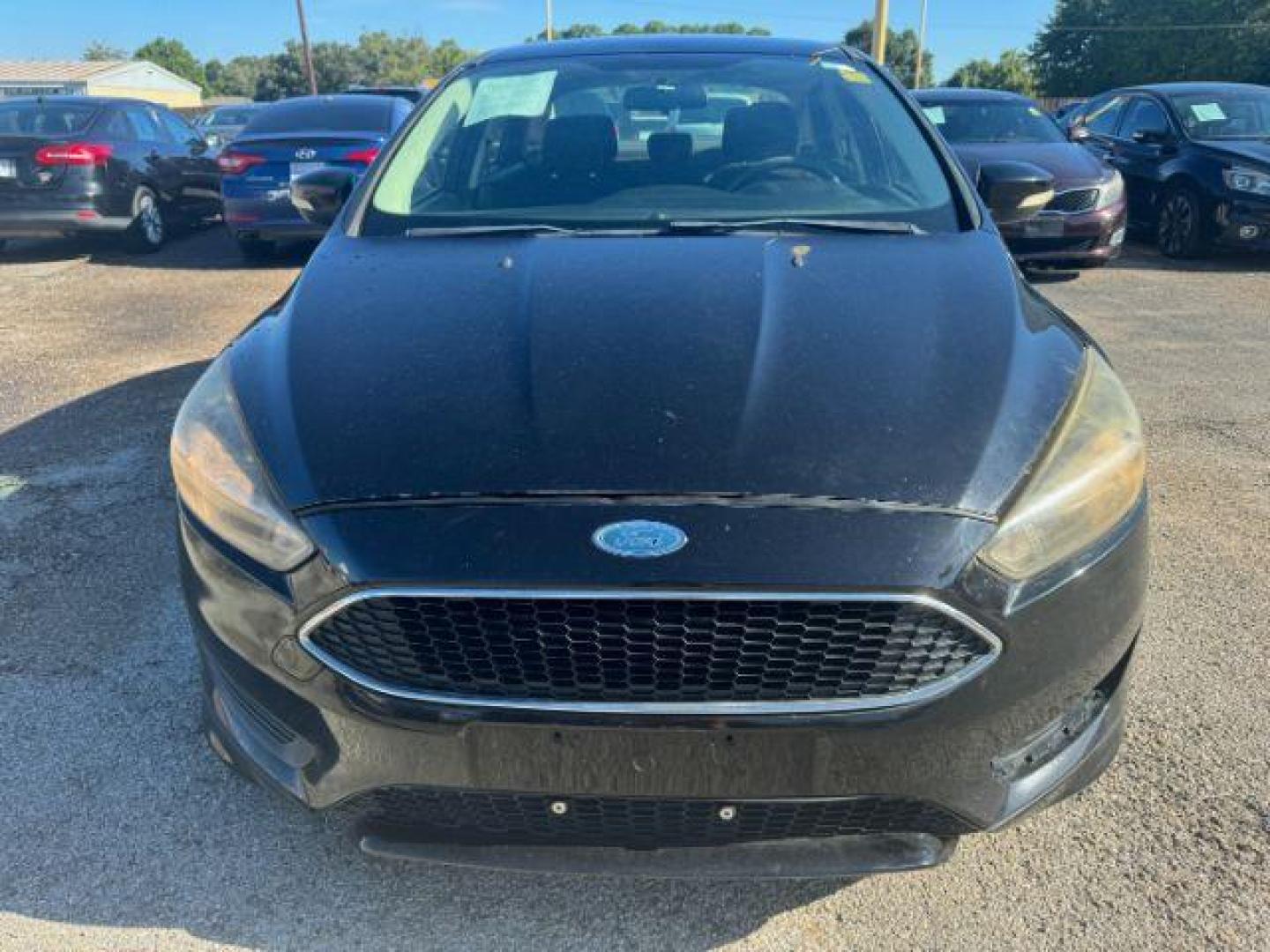 2017 BLACK Ford Focus SE Sedan (1FADP3F24HL) with an 2.0L L4 DOHC 16V engine, located at 2715 W Pioneer Pkwy, Arlington, TX, 76013, (817) 265-9009, 32.710262, -97.153236 - Photo#4