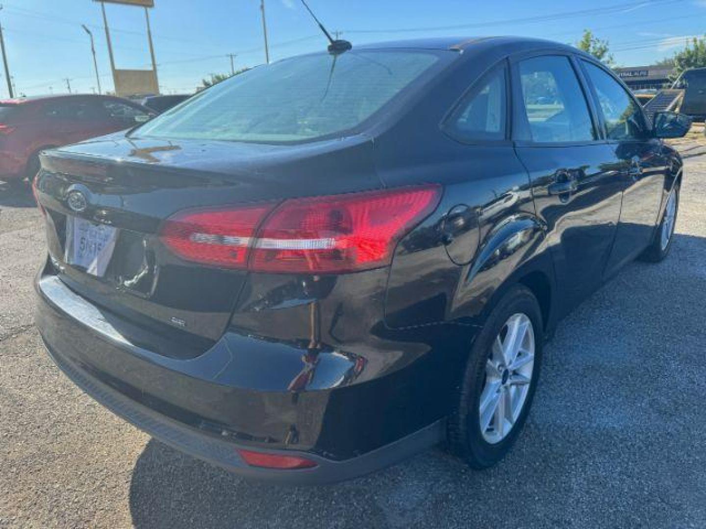 2017 BLACK Ford Focus SE Sedan (1FADP3F24HL) with an 2.0L L4 DOHC 16V engine, located at 2715 W Pioneer Pkwy, Arlington, TX, 76013, (817) 265-9009, 32.710262, -97.153236 - Photo#6