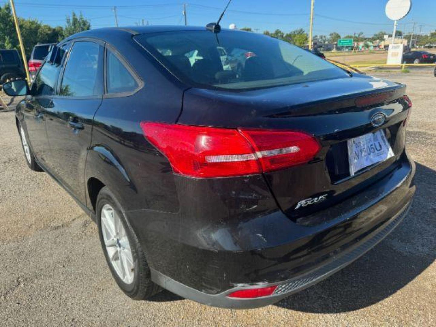2017 BLACK Ford Focus SE Sedan (1FADP3F24HL) with an 2.0L L4 DOHC 16V engine, located at 2715 W Pioneer Pkwy, Arlington, TX, 76013, (817) 265-9009, 32.710262, -97.153236 - Photo#8