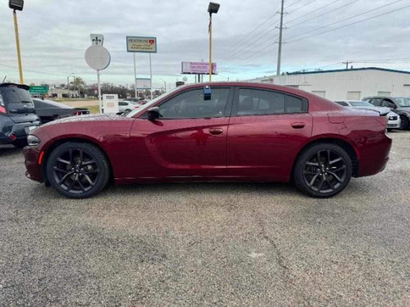 2019 MAROON Dodge Charger SXT (2C3CDXBG2KH) with an 3.6L V6 DOHC 24V engine, 8-Speed Automatic transmission, located at 2715 W Pioneer Pkwy, Arlington, TX, 76013, (817) 265-9009, 32.710262, -97.153236 - Photo#2