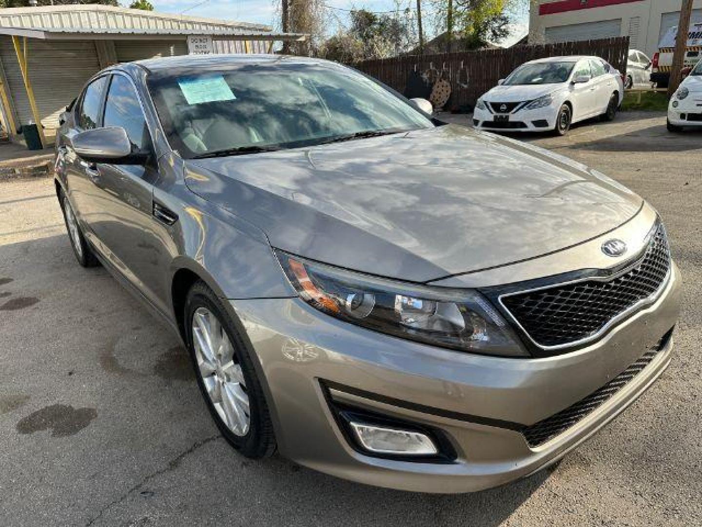 2015 GRAY Kia Optima LX (5XXGM4A77FG) with an 2.4L L4 DOHC 16V engine, 6-Speed Automatic transmission, located at 2715 W Pioneer Pkwy, Arlington, TX, 76013, (817) 265-9009, 32.710262, -97.153236 - Photo#4