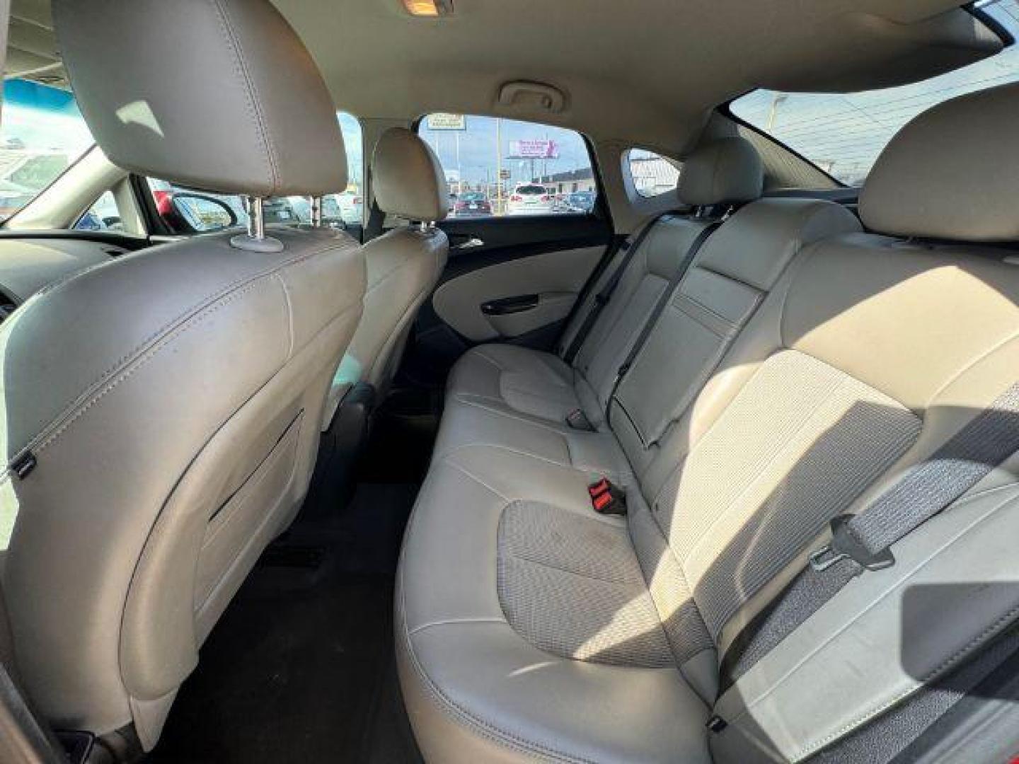 2012 RED Buick Verano Convenience (1G4PR5SK4C4) with an 2.4L L4 DOHC 16V FFV engine, 6-Speed Automatic transmission, located at 2715 W Pioneer Pkwy, Arlington, TX, 76013, (817) 265-9009, 32.710262, -97.153236 - Photo#10