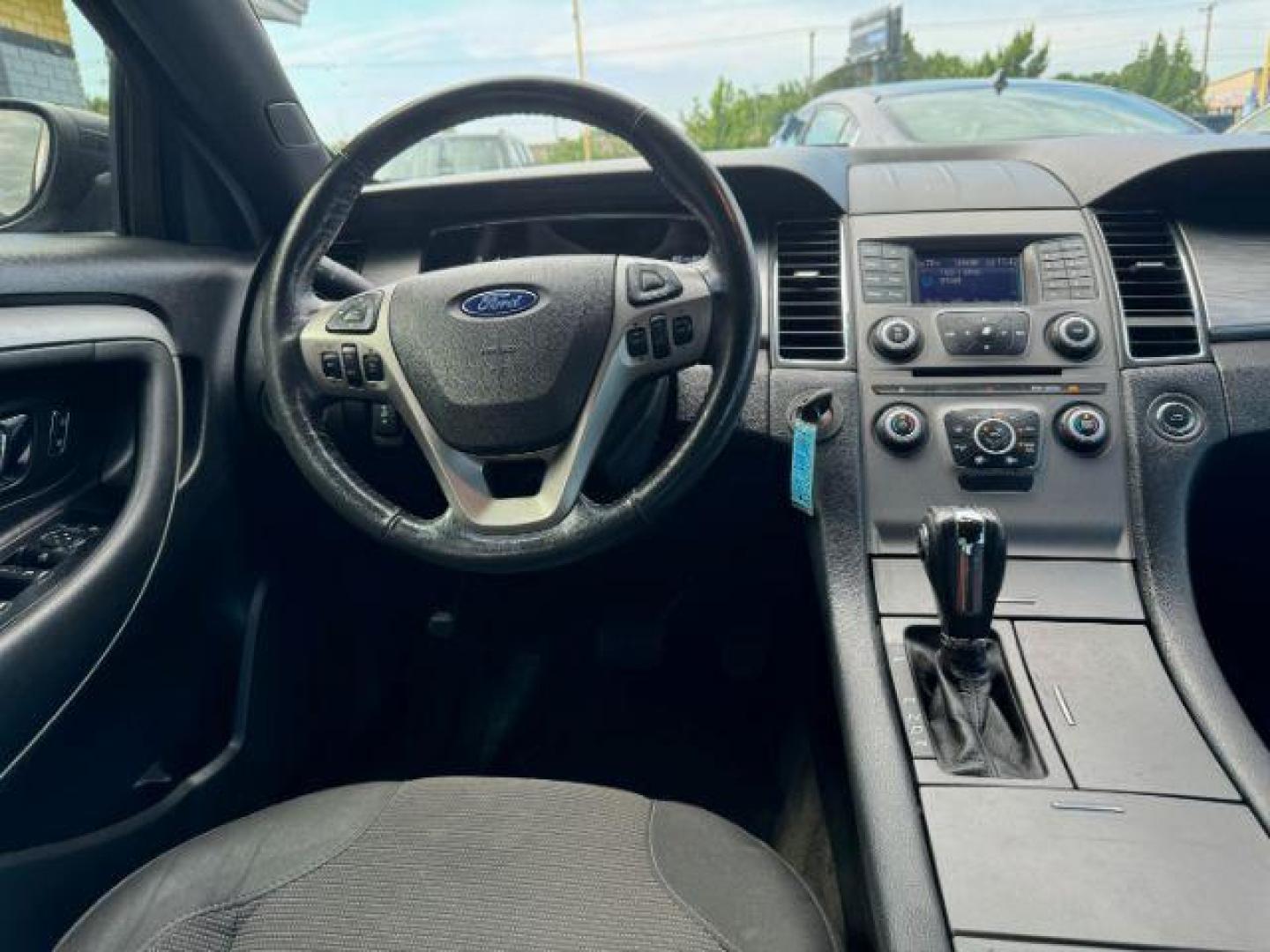 2014 BLACK Ford Taurus SEL FWD (1FAHP2E8XEG) with an 3.5L V6 DOHC 24V engine, 6-Speed Automatic transmission, located at 2715 W Pioneer Pkwy, Arlington, TX, 76013, (817) 265-9009, 32.710262, -97.153236 - Photo#12