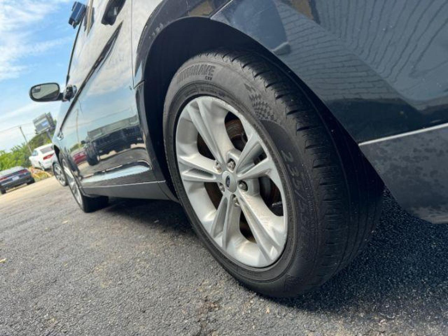 2014 BLACK Ford Taurus SEL FWD (1FAHP2E8XEG) with an 3.5L V6 DOHC 24V engine, 6-Speed Automatic transmission, located at 2715 W Pioneer Pkwy, Arlington, TX, 76013, (817) 265-9009, 32.710262, -97.153236 - Photo#8