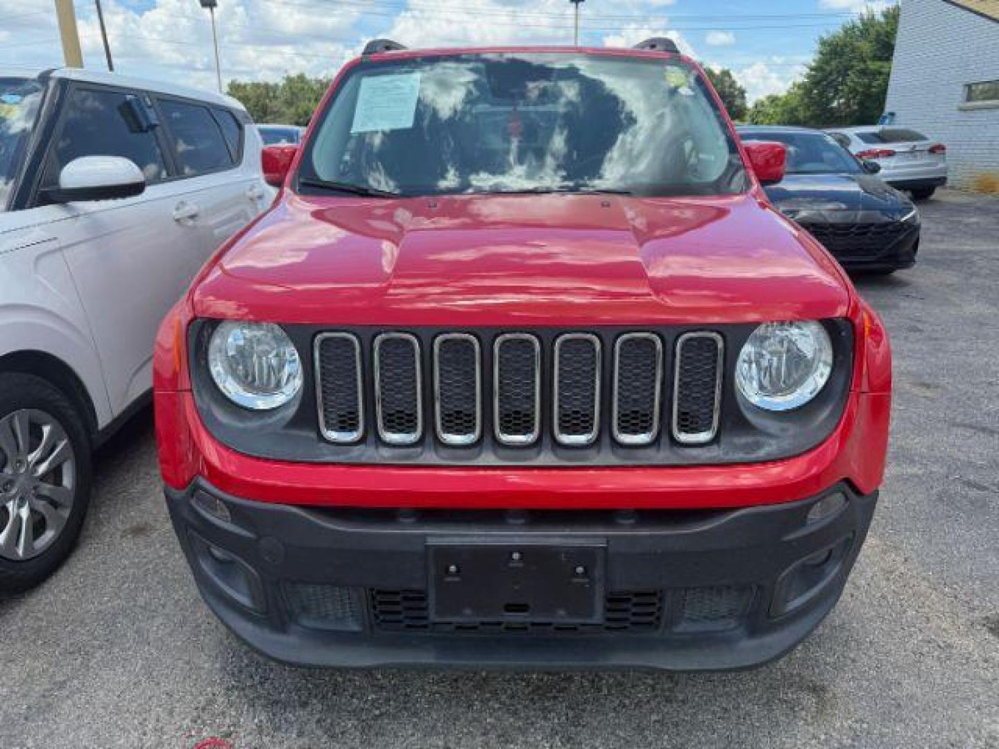 2017 Colorado Red Jeep Renegade Latitude FWD (ZACCJABB1HP) with an 2.4L L4 DOHC 16V engine, 6-Speed Manual transmission, located at 2715 W Pioneer Pkwy, Arlington, TX, 76013, (817) 265-9009, 32.710262, -97.153236 - Photo#4