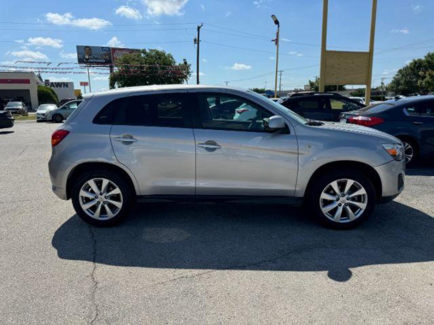 2015 SILVER Mitsubishi Outlander Sport ES 2WD (4A4AP3AU7FE) with an 2.0L L4 DOHC 16V engine, Continuously Variabl transmission, located at 2715 W Pioneer Pkwy, Arlington, TX, 76013, (817) 265-9009, 32.710262, -97.153236 - Photo#6