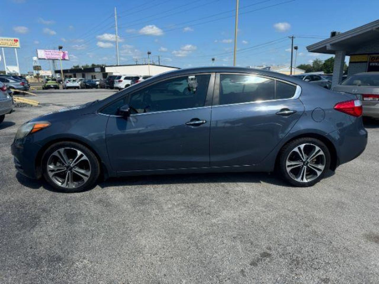 2015 GRAY Kia Forte EX (KNAFX4A83F5) with an 2.0L L4 DOHC 16V engine, 6-Speed Automatic transmission, located at 2715 W Pioneer Pkwy, Arlington, TX, 76013, (817) 265-9009, 32.710262, -97.153236 - Photo#2