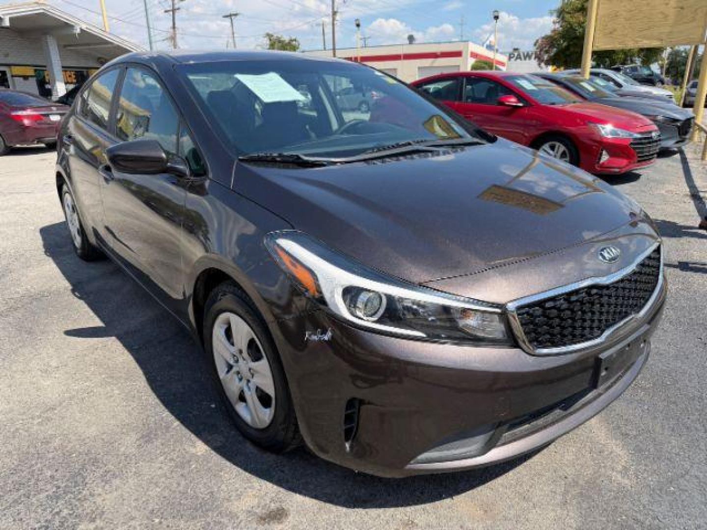 2017 BROWN Kia Forte LX 6A (3KPFL4A78HE) with an 2.0L L4 DOHC 16V engine, 6-Speed Automatic transmission, located at 2715 W Pioneer Pkwy, Arlington, TX, 76013, (817) 265-9009, 32.710262, -97.153236 - Photo#4
