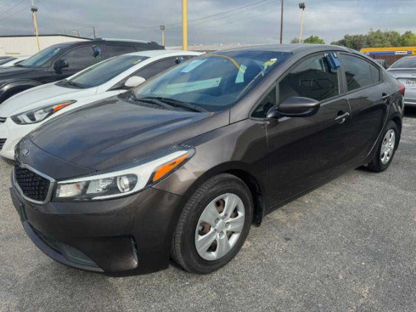 2017 BROWN Kia Forte LX 6A (3KPFK4A76HE) with an 2.0L L4 DOHC 16V engine, 6-Speed Automatic transmission, located at 2715 W Pioneer Pkwy, Arlington, TX, 76013, (817) 265-9009, 32.710262, -97.153236 - Photo#3