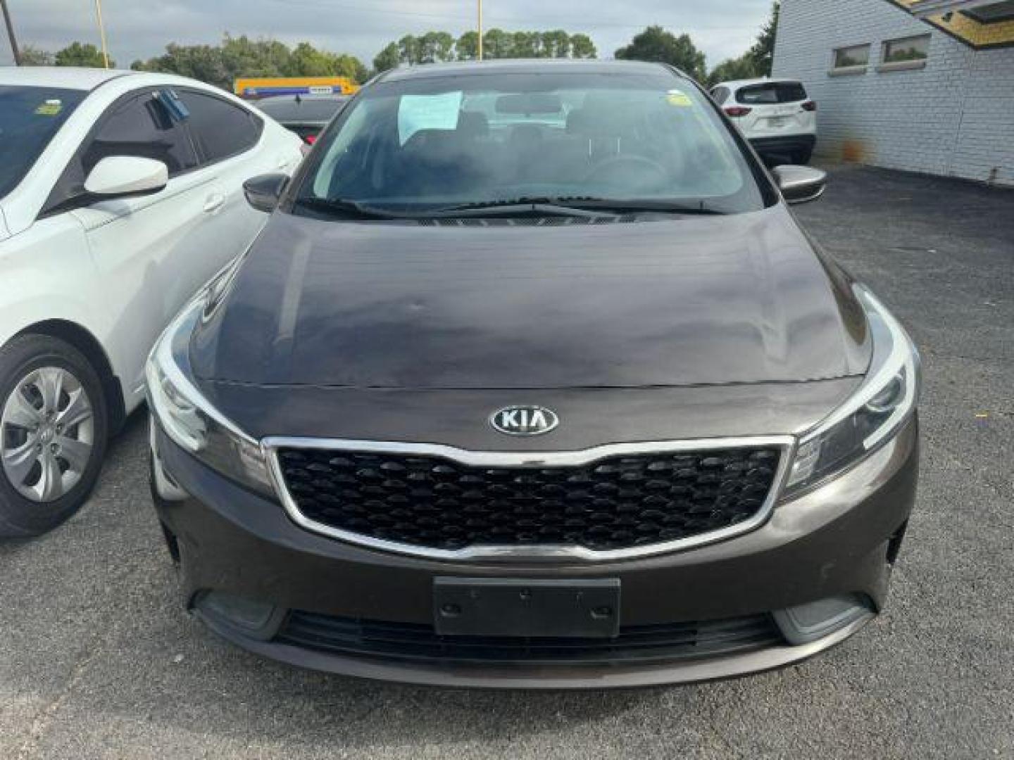2017 BROWN Kia Forte LX 6A (3KPFK4A76HE) with an 2.0L L4 DOHC 16V engine, 6-Speed Automatic transmission, located at 2715 W Pioneer Pkwy, Arlington, TX, 76013, (817) 265-9009, 32.710262, -97.153236 - Photo#4