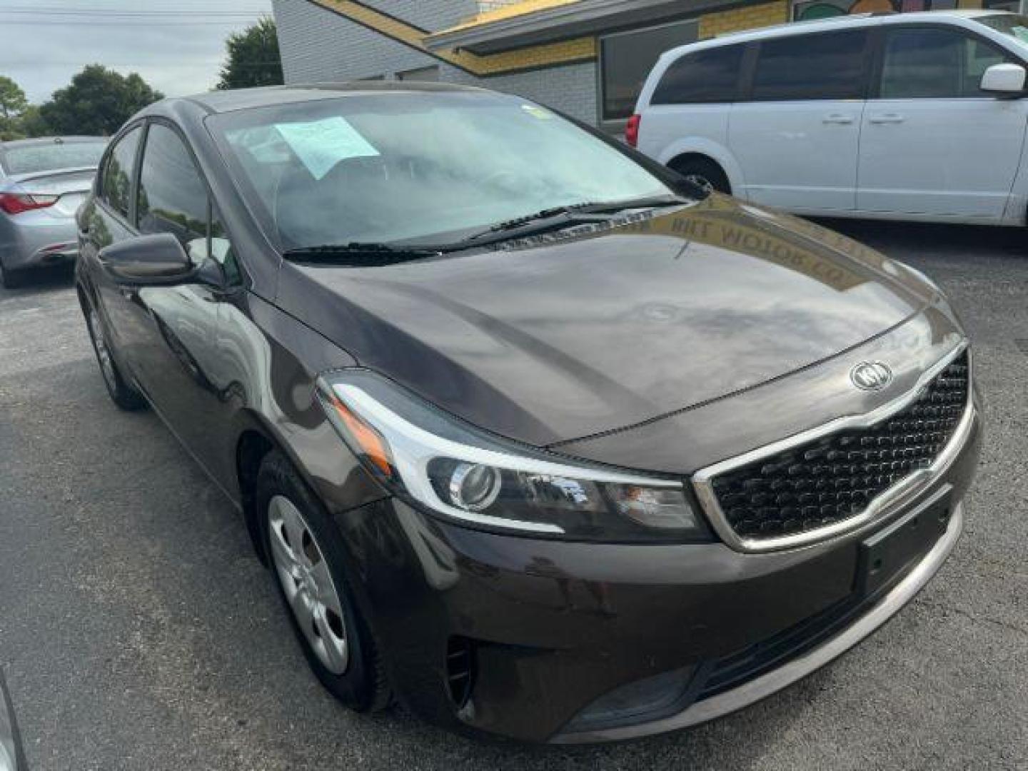 2017 BROWN Kia Forte LX 6A (3KPFK4A76HE) with an 2.0L L4 DOHC 16V engine, 6-Speed Automatic transmission, located at 2715 W Pioneer Pkwy, Arlington, TX, 76013, (817) 265-9009, 32.710262, -97.153236 - Photo#5