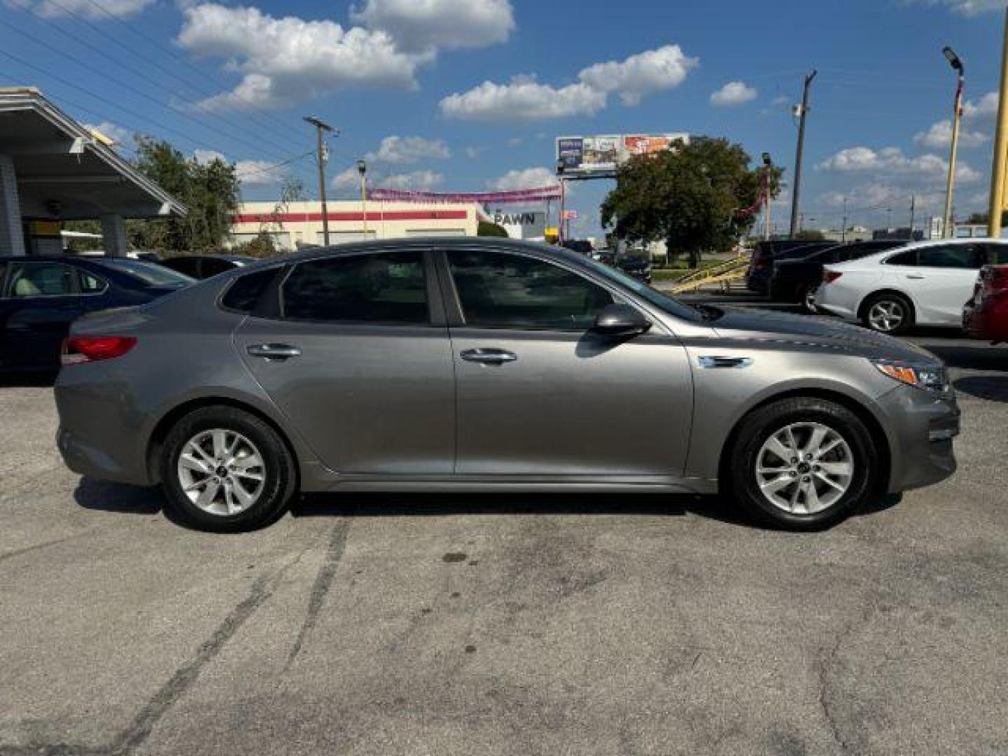 2016 GRAY Kia Optima LX (5XXGT4L37GG) with an 2.4L L4 DOHC 16V engine, 6-Speed Automatic transmission, located at 2715 W Pioneer Pkwy, Arlington, TX, 76013, (817) 265-9009, 32.710262, -97.153236 - Photo#6