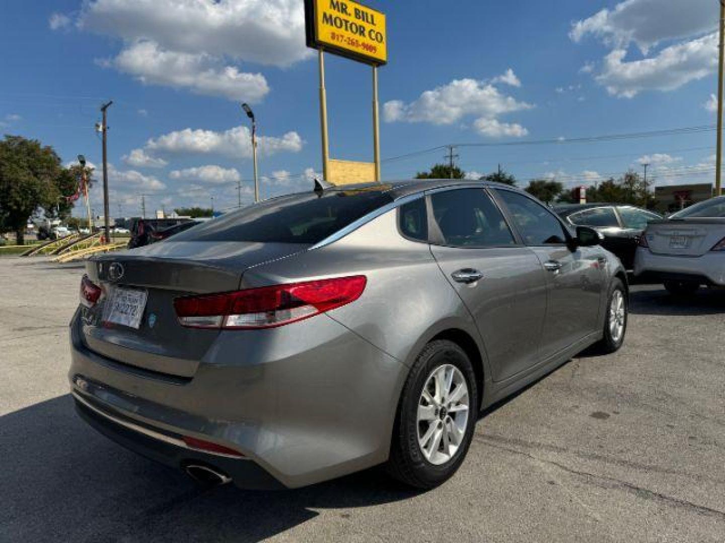 2016 GRAY Kia Optima LX (5XXGT4L37GG) with an 2.4L L4 DOHC 16V engine, 6-Speed Automatic transmission, located at 2715 W Pioneer Pkwy, Arlington, TX, 76013, (817) 265-9009, 32.710262, -97.153236 - Photo#7