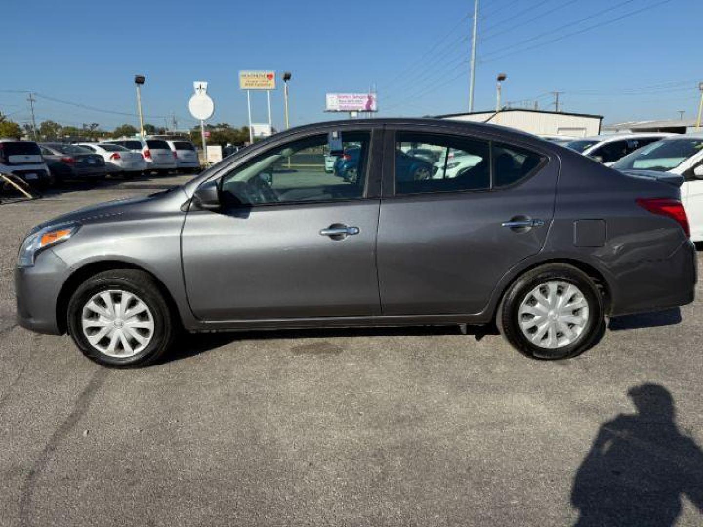 2019 GRAY Nissan Versa 1.6 SV Sedan (3N1CN7AP7KL) with an 1.6L L4 DOHC 16V engine, Continuously Variable Transmission transmission, located at 2715 W Pioneer Pkwy, Arlington, TX, 76013, (817) 265-9009, 32.710262, -97.153236 - Photo#2