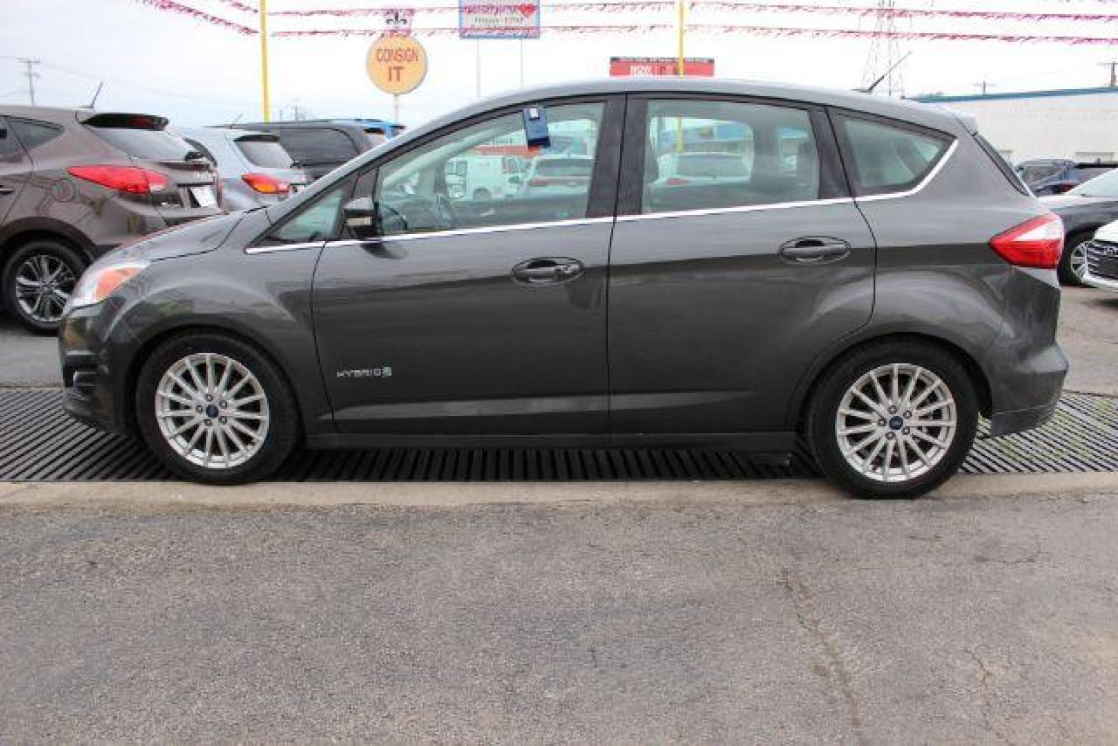 2016 GRAY Ford C-Max Hybrid SE (1FADP5AU9GL) with an 2.0L L4 DOHC 16V HYBRID engine, Continuously Variable Transmission transmission, located at 2715 W Pioneer Pkwy, Arlington, TX, 76013, (817) 265-9009, 32.710262, -97.153236 - Photo#1