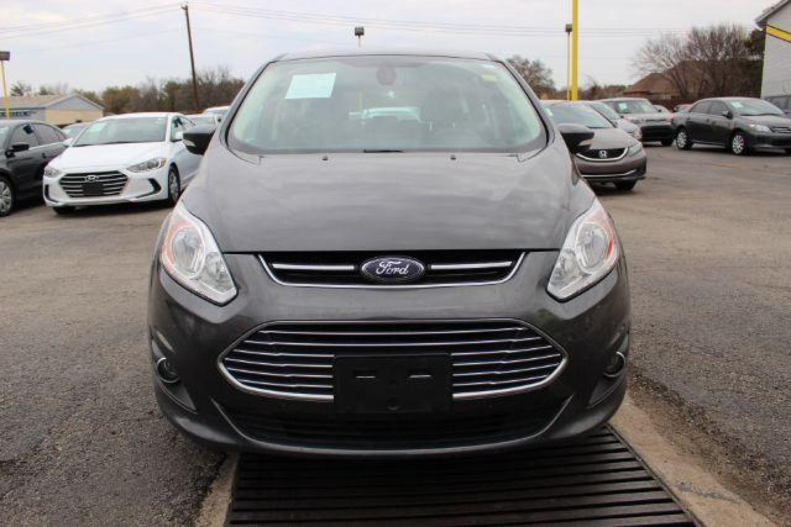2016 GRAY Ford C-Max Hybrid SE (1FADP5AU9GL) with an 2.0L L4 DOHC 16V HYBRID engine, Continuously Variable Transmission transmission, located at 2715 W Pioneer Pkwy, Arlington, TX, 76013, (817) 265-9009, 32.710262, -97.153236 - Photo#3