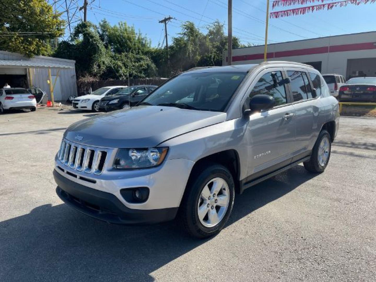 2015 SILVER Jeep Compass Sport FWD (1C4NJCBA2FD) with an 2.0L L4 DOHC 16V engine, located at 2715 W Pioneer Pkwy, Arlington, TX, 76013, (817) 265-9009, 32.710262, -97.153236- Photo#2