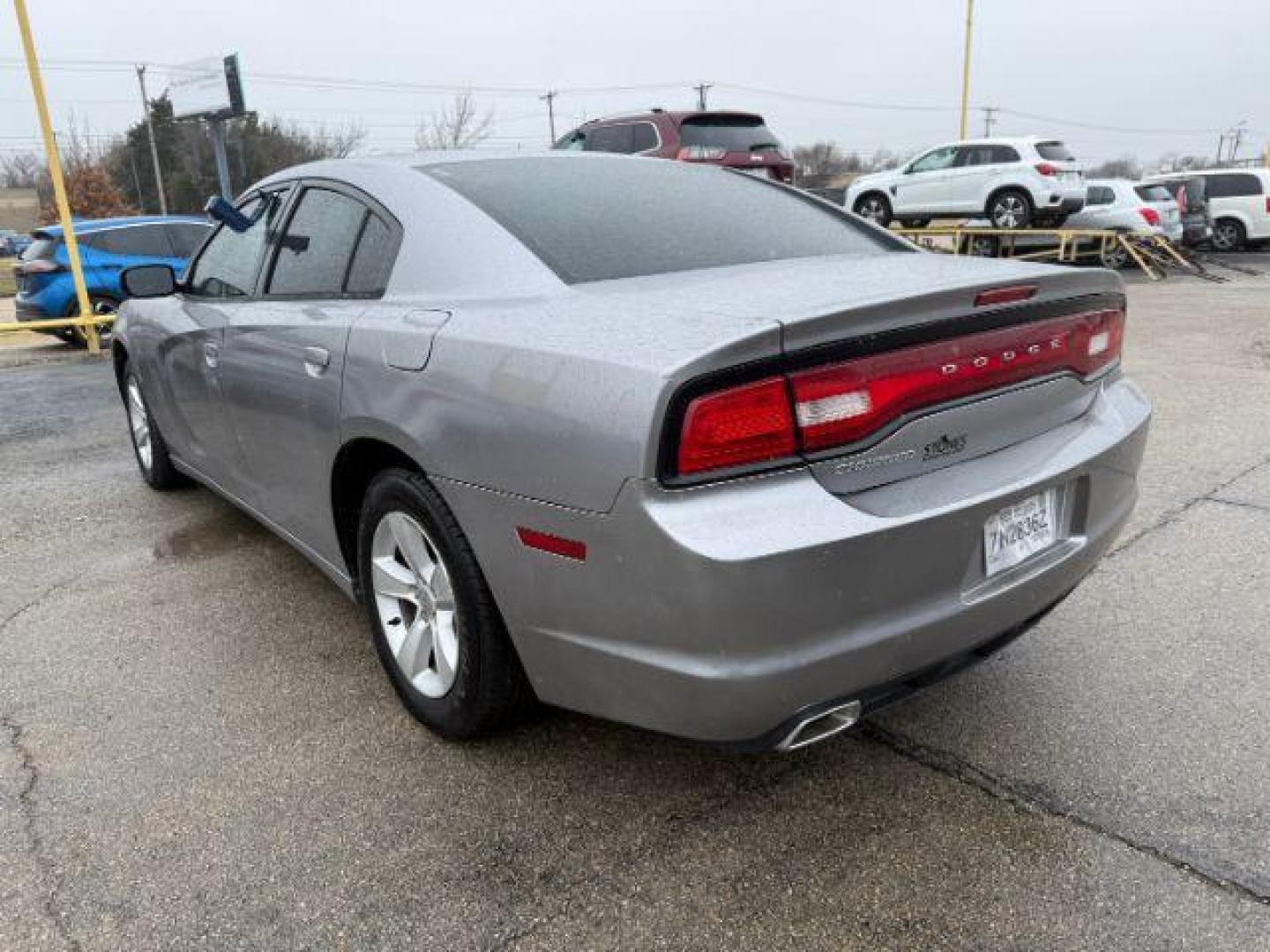 2014 SILVER Dodge Charger SE (2C3CDXBG5EH) with an 3.6L V6 DOHC 24V engine, 5-Speed Automatic transmission, located at 2715 W Pioneer Pkwy, Arlington, TX, 76013, (817) 265-9009, 32.710262, -97.153236 - Photo#9