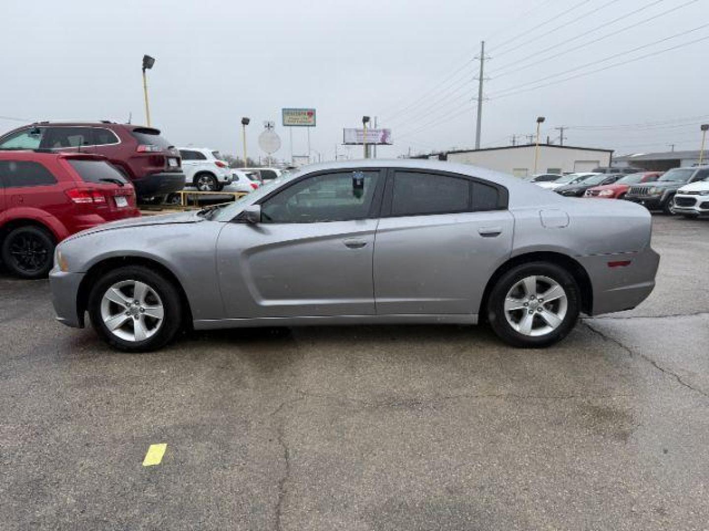 2014 SILVER Dodge Charger SE (2C3CDXBG5EH) with an 3.6L V6 DOHC 24V engine, 5-Speed Automatic transmission, located at 2715 W Pioneer Pkwy, Arlington, TX, 76013, (817) 265-9009, 32.710262, -97.153236 - Photo#2