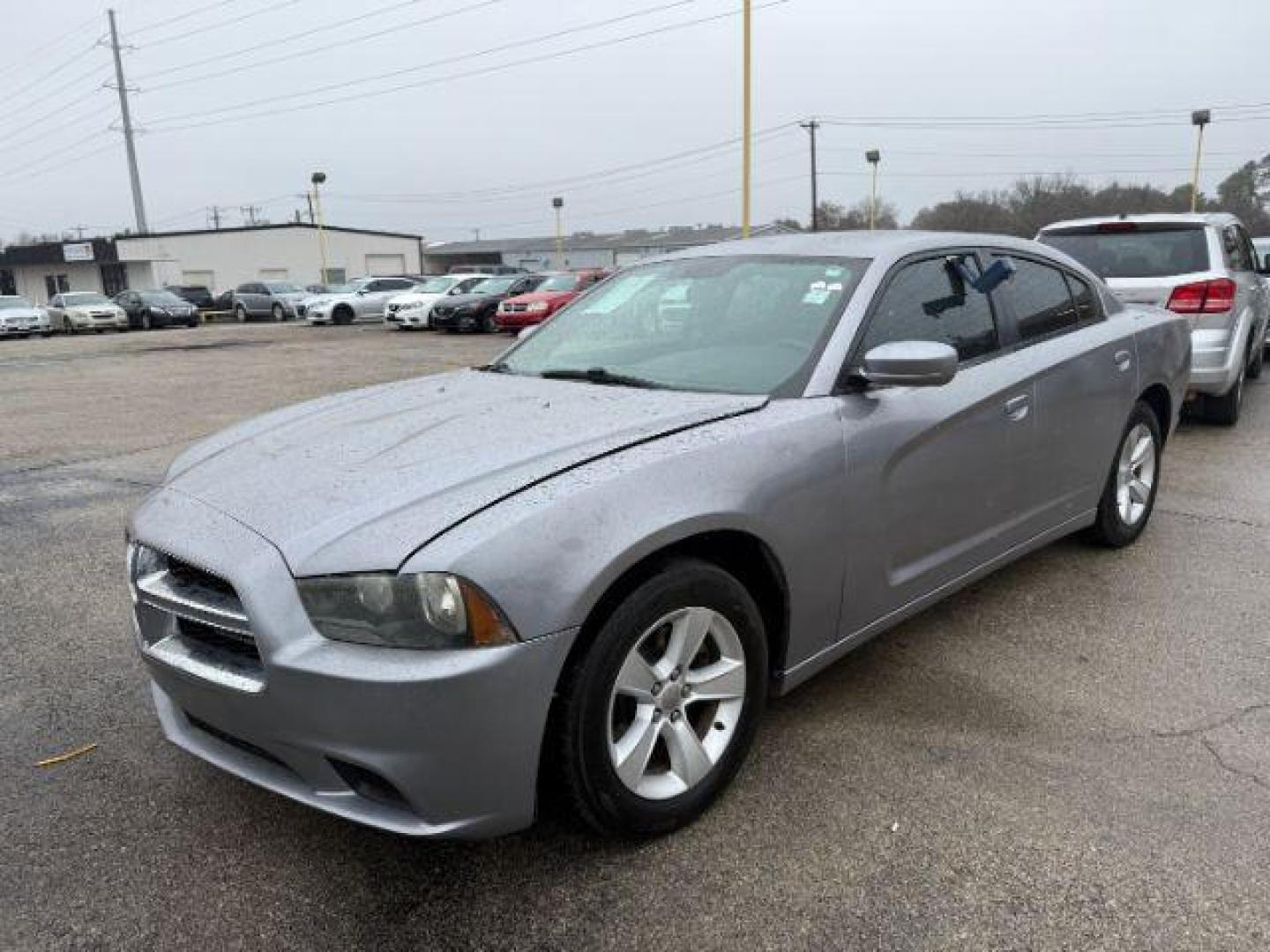 2014 SILVER Dodge Charger SE (2C3CDXBG5EH) with an 3.6L V6 DOHC 24V engine, 5-Speed Automatic transmission, located at 2715 W Pioneer Pkwy, Arlington, TX, 76013, (817) 265-9009, 32.710262, -97.153236 - Photo#3