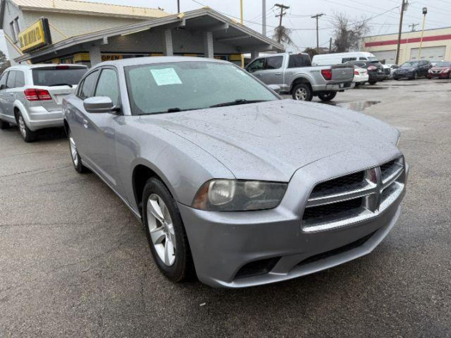 2014 SILVER Dodge Charger SE (2C3CDXBG5EH) with an 3.6L V6 DOHC 24V engine, 5-Speed Automatic transmission, located at 2715 W Pioneer Pkwy, Arlington, TX, 76013, (817) 265-9009, 32.710262, -97.153236 - Photo#5