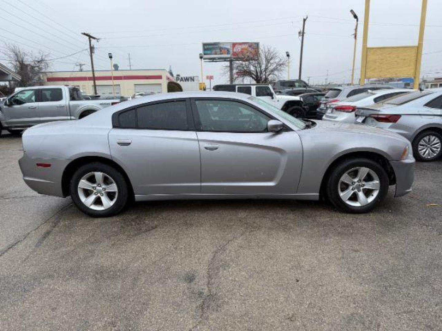 2014 SILVER Dodge Charger SE (2C3CDXBG5EH) with an 3.6L V6 DOHC 24V engine, 5-Speed Automatic transmission, located at 2715 W Pioneer Pkwy, Arlington, TX, 76013, (817) 265-9009, 32.710262, -97.153236 - Photo#6