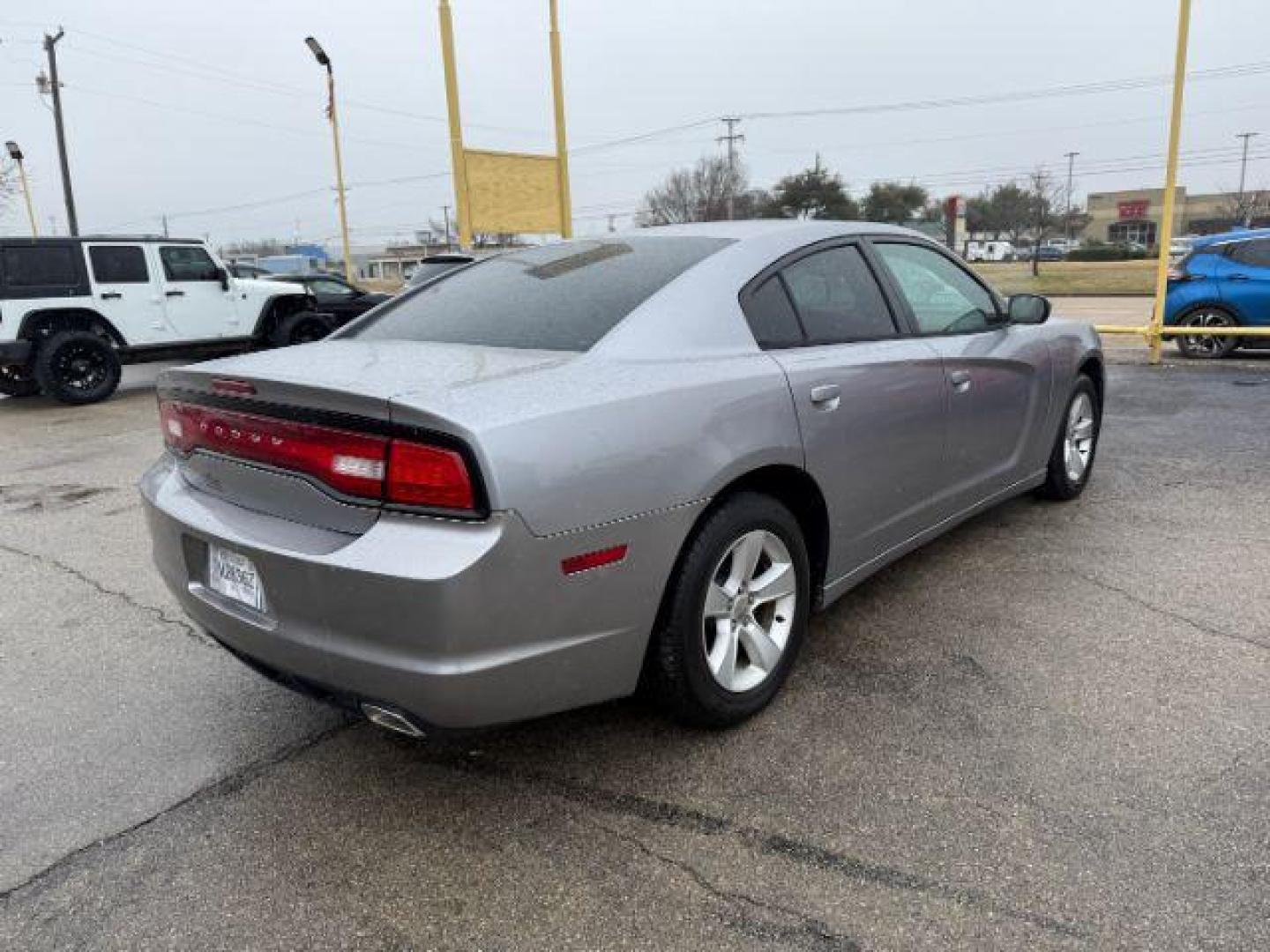 2014 SILVER Dodge Charger SE (2C3CDXBG5EH) with an 3.6L V6 DOHC 24V engine, 5-Speed Automatic transmission, located at 2715 W Pioneer Pkwy, Arlington, TX, 76013, (817) 265-9009, 32.710262, -97.153236 - Photo#7