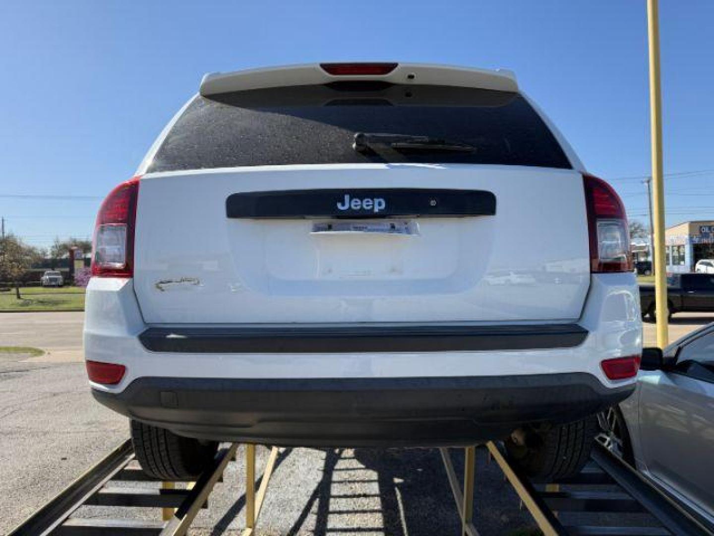 2016 WHITE Jeep Compass Sport (1C4NJCBA4GD) with an 2.4L I-4 DOHC engine, located at 2715 W Pioneer Pkwy, Arlington, TX, 76013, (817) 265-9009, 32.710262, -97.153236 - Photo#7