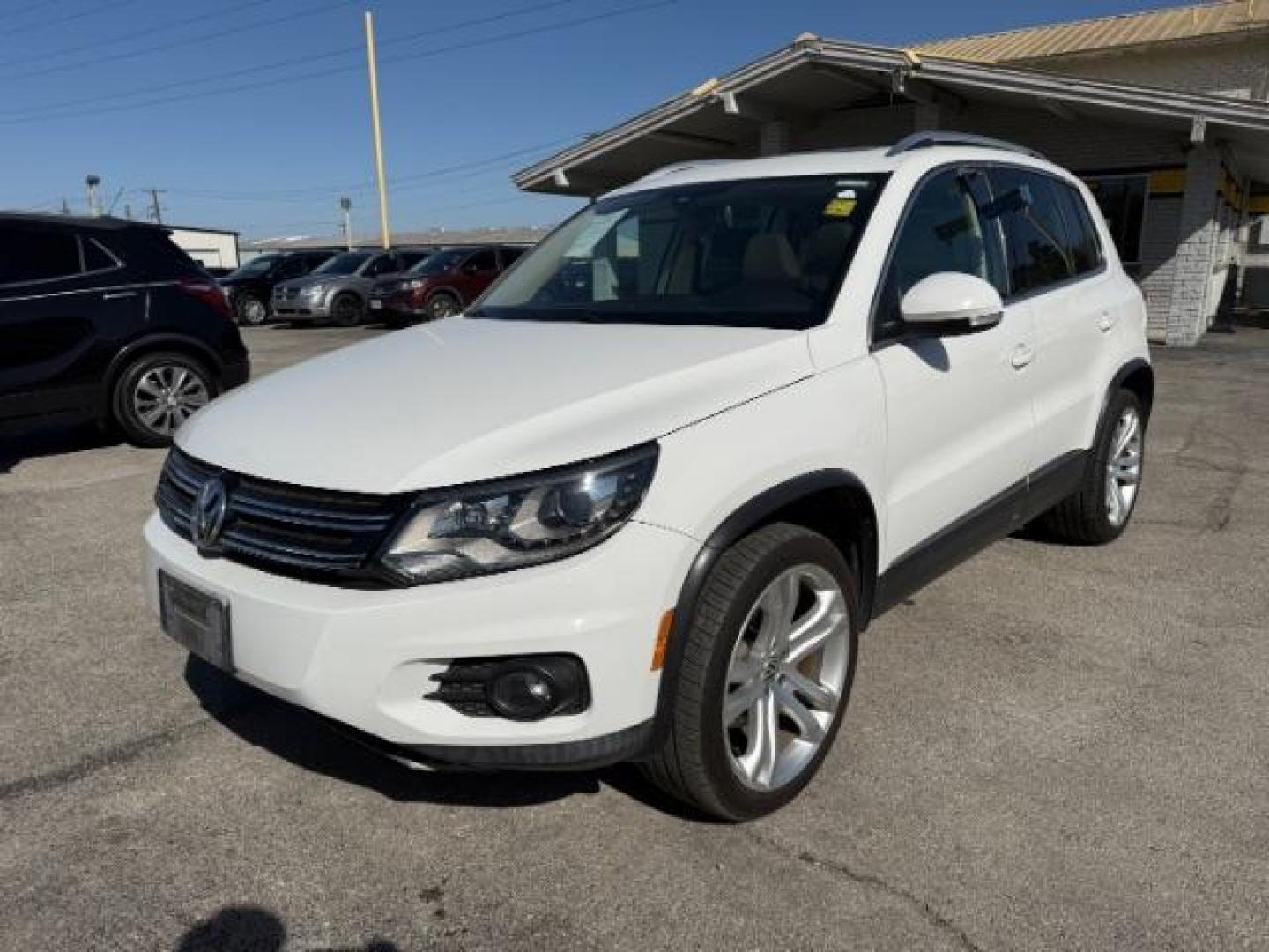 2012 WHITE Volkswagen Tiguan SEL (WVGAV7AX5CW) with an 2L I-4 gasoline dire engine, located at 2715 W Pioneer Pkwy, Arlington, TX, 76013, (817) 265-9009, 32.710262, -97.153236 - Photo#2