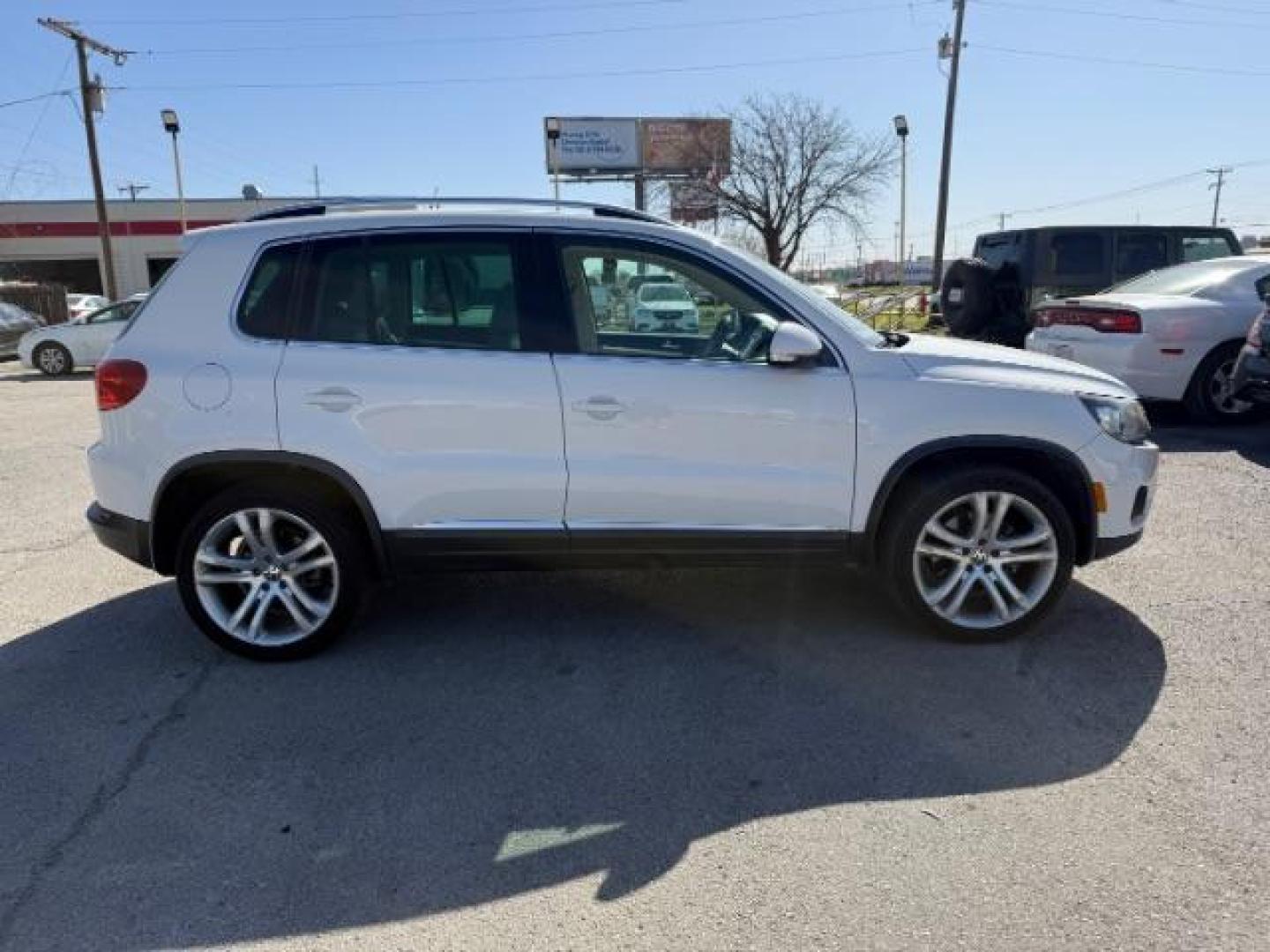 2012 WHITE Volkswagen Tiguan SEL (WVGAV7AX5CW) with an 2L I-4 gasoline dire engine, located at 2715 W Pioneer Pkwy, Arlington, TX, 76013, (817) 265-9009, 32.710262, -97.153236 - Photo#5