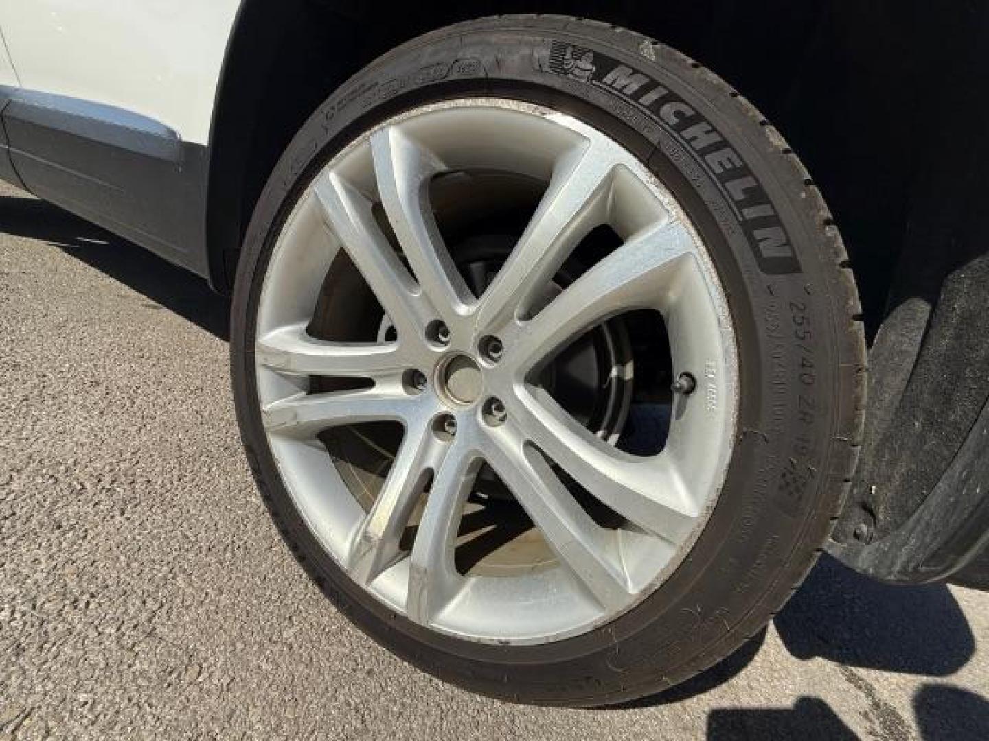 2012 WHITE Volkswagen Tiguan SEL (WVGAV7AX5CW) with an 2L I-4 gasoline dire engine, located at 2715 W Pioneer Pkwy, Arlington, TX, 76013, (817) 265-9009, 32.710262, -97.153236 - Photo#9