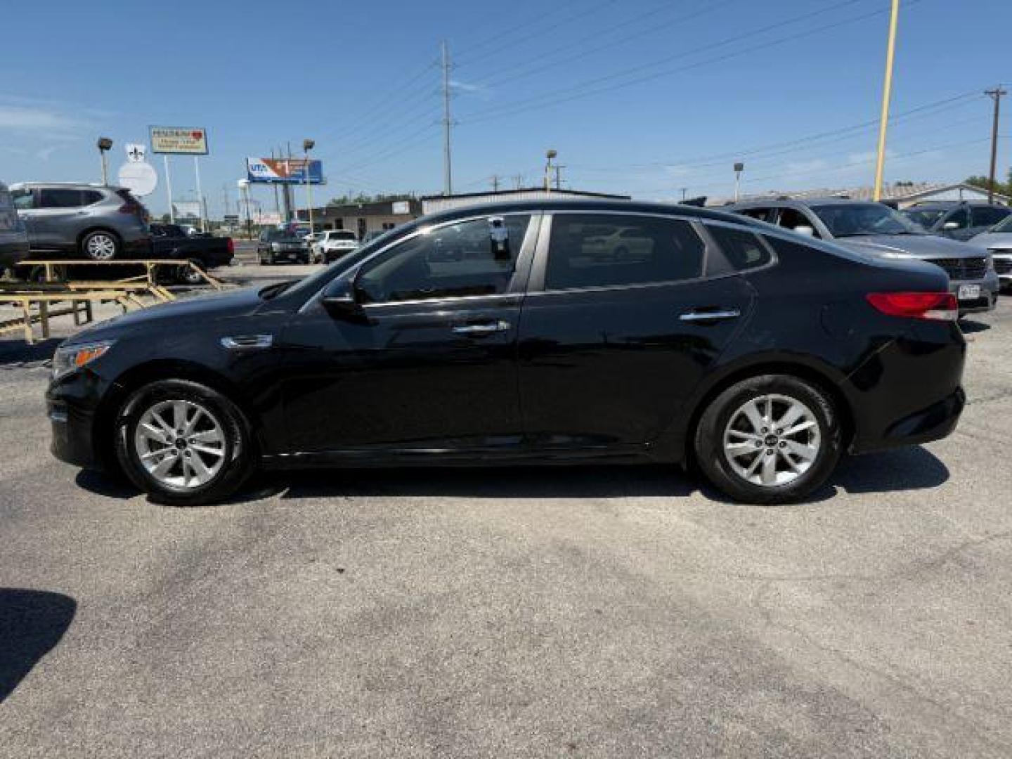 2017 BLACK Kia Optima LX (5XXGT4L3XHG) with an Theta II 2.4L I-4 gasoline direct injection engine, located at 2715 W Pioneer Pkwy, Arlington, TX, 76013, (817) 265-9009, 32.710262, -97.153236 - Photo#2
