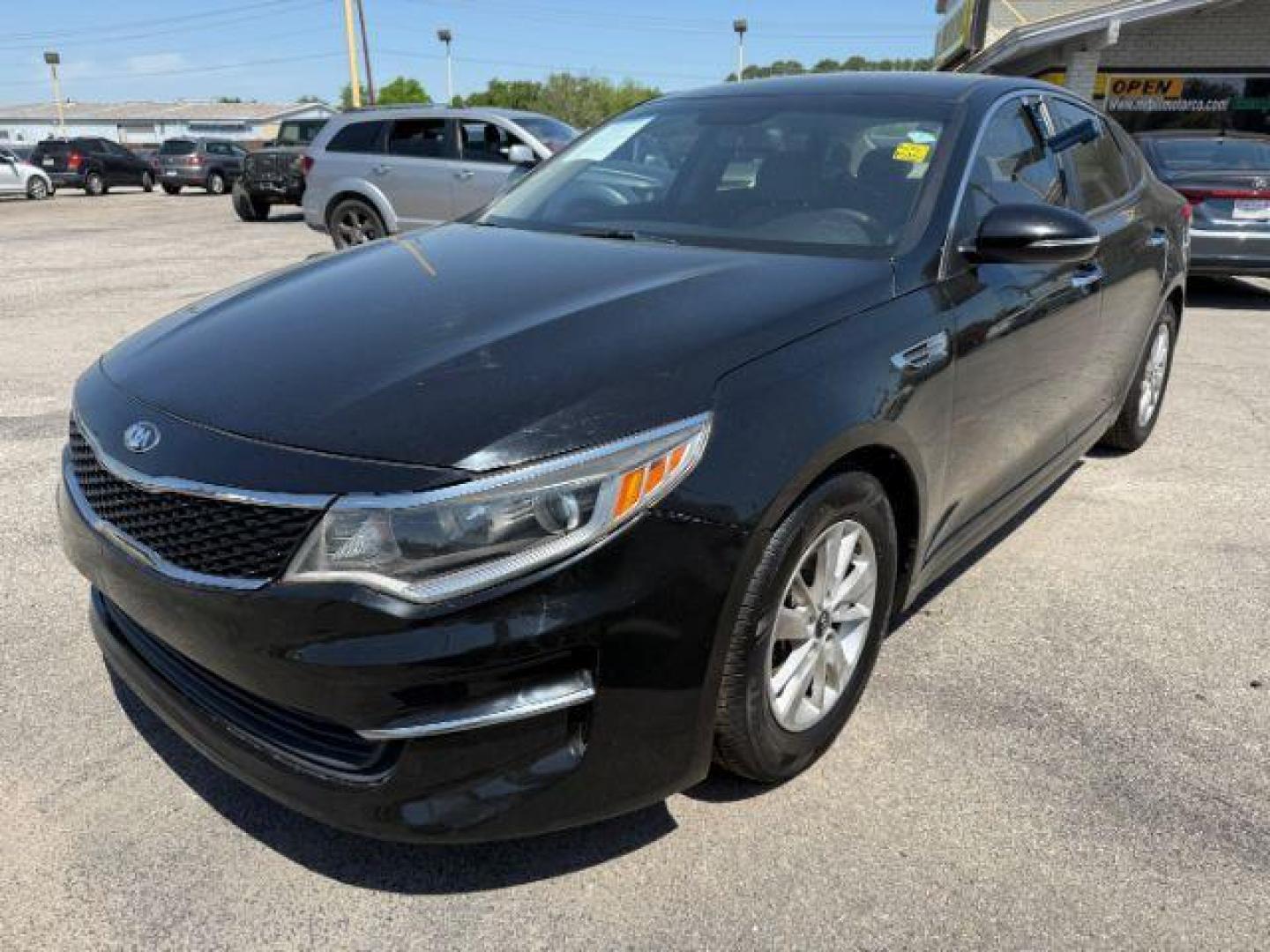 2017 BLACK Kia Optima LX (5XXGT4L3XHG) with an Theta II 2.4L I-4 gasoline direct injection engine, located at 2715 W Pioneer Pkwy, Arlington, TX, 76013, (817) 265-9009, 32.710262, -97.153236 - Photo#3