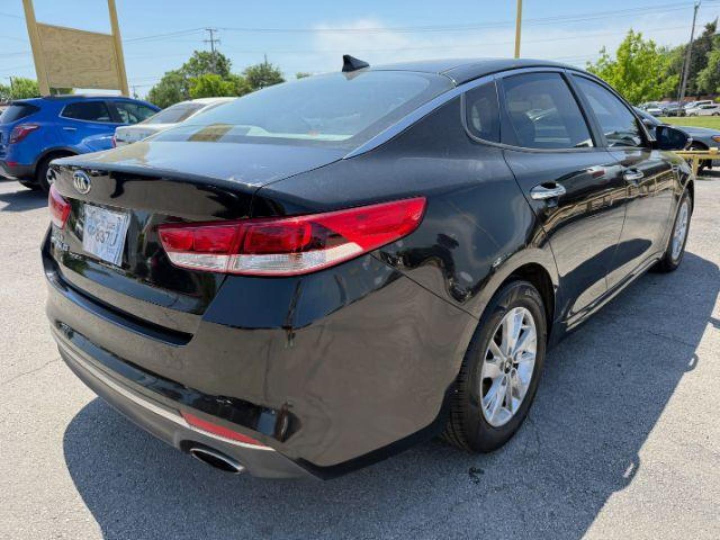 2017 BLACK Kia Optima LX (5XXGT4L3XHG) with an Theta II 2.4L I-4 gasoline direct injection engine, located at 2715 W Pioneer Pkwy, Arlington, TX, 76013, (817) 265-9009, 32.710262, -97.153236 - Photo#6