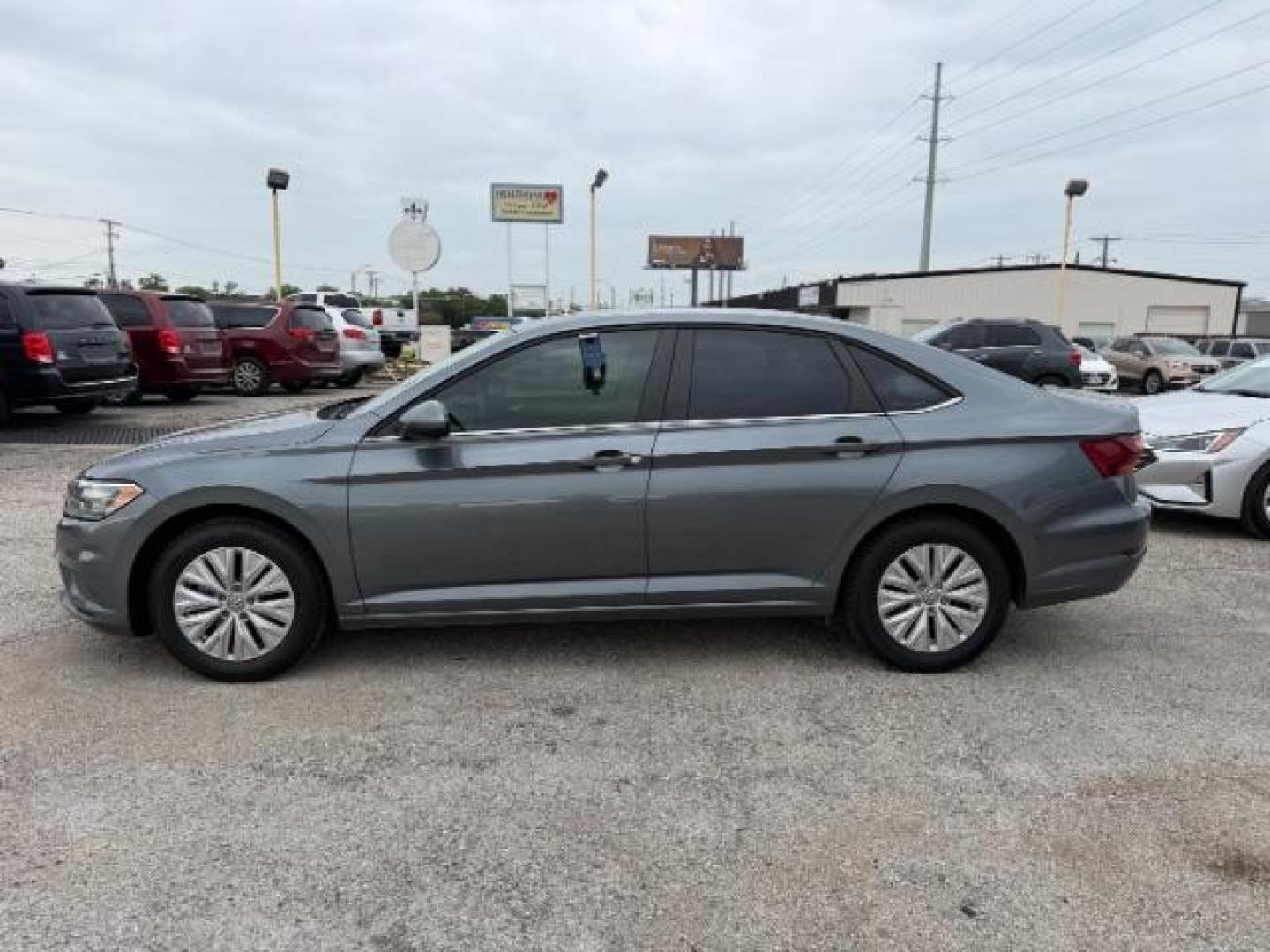 2019 GRAY Volkswagen Jetta 1.4T S | 1.4T SE | 1 (3VWCB7BU5KM) with an 1.4L I-4 gasoline di engine, located at 2715 W Pioneer Pkwy, Arlington, TX, 76013, (817) 265-9009, 32.710262, -97.153236 - Photo#2