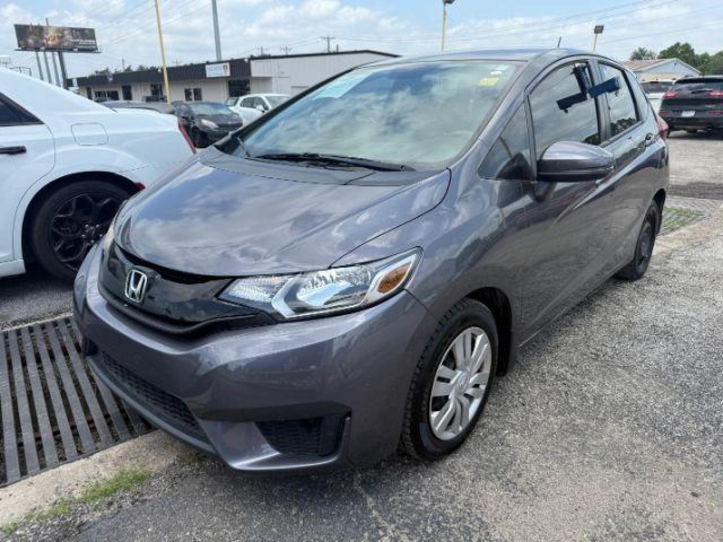 2016 GRAY Honda Fit LX CVT (JHMGK5H5XGX) with an 1.5L L4 SOHC 16V engine, Continuously Variable Transmission transmission, located at 2715 W Pioneer Pkwy, Arlington, TX, 76013, (817) 265-9009, 32.710262, -97.153236 - Photo#3