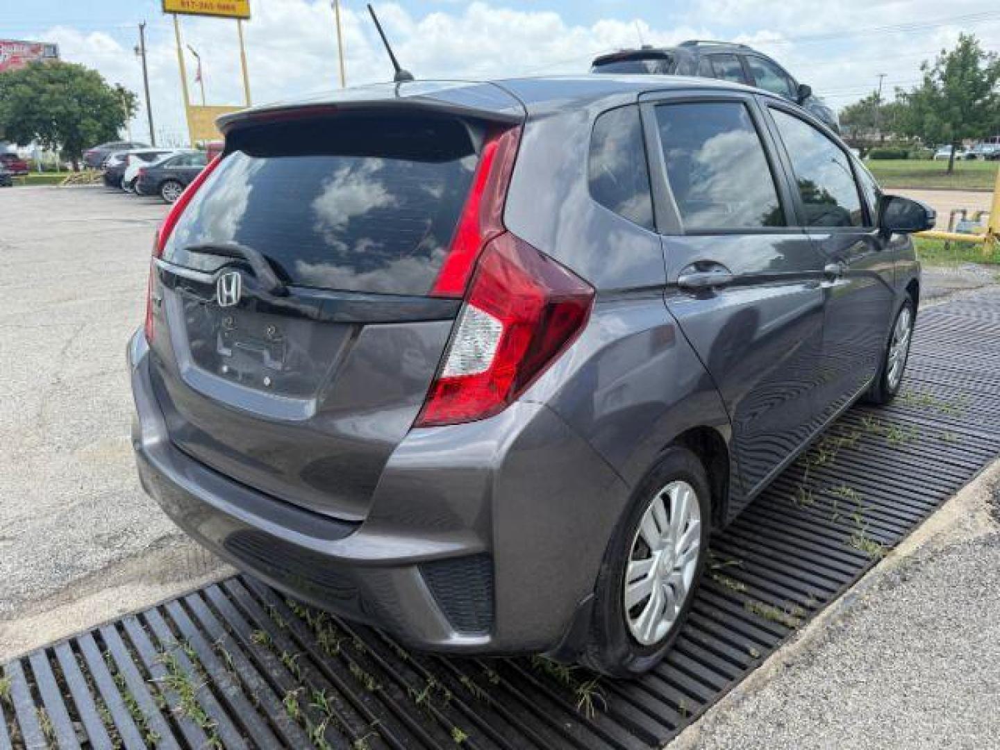 2016 GRAY Honda Fit LX CVT (JHMGK5H5XGX) with an 1.5L L4 SOHC 16V engine, Continuously Variable Transmission transmission, located at 2715 W Pioneer Pkwy, Arlington, TX, 76013, (817) 265-9009, 32.710262, -97.153236 - Photo#6