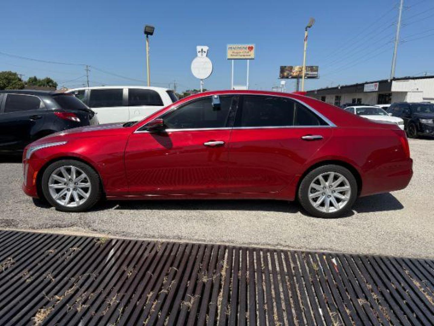 2015 RED Cadillac CTS Luxury (1G6AR5S32F0) with an 3.6L V-6 gasoline direct injection engine, located at 2715 W Pioneer Pkwy, Arlington, TX, 76013, (817) 265-9009, 32.710262, -97.153236 - Photo#2
