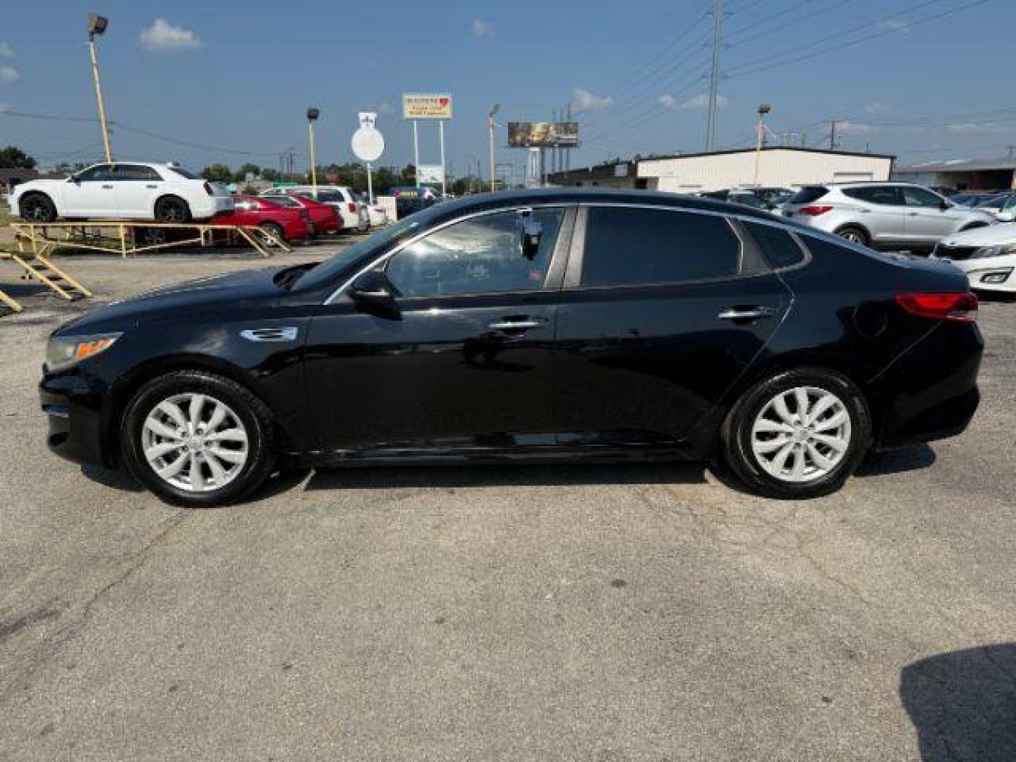 2016 BLACK Kia Optima LX (5XXGT4L35GG) with an Theta II 2.4L I-4 ga engine, located at 2715 W Pioneer Pkwy, Arlington, TX, 76013, (817) 265-9009, 32.710262, -97.153236 - Photo#1