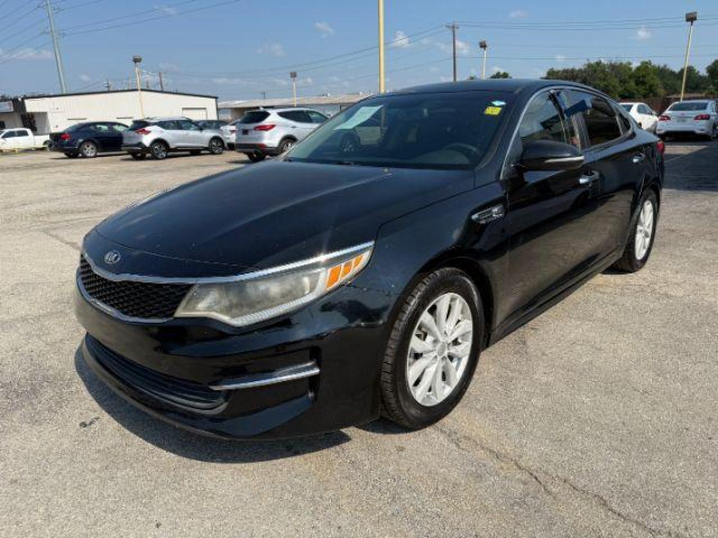 2016 BLACK Kia Optima LX (5XXGT4L35GG) with an Theta II 2.4L I-4 ga engine, located at 2715 W Pioneer Pkwy, Arlington, TX, 76013, (817) 265-9009, 32.710262, -97.153236 - Photo#2