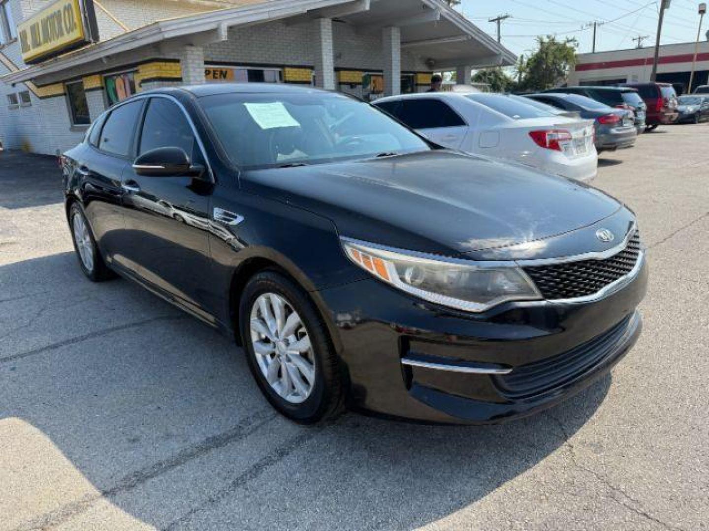 2016 BLACK Kia Optima LX (5XXGT4L35GG) with an Theta II 2.4L I-4 ga engine, located at 2715 W Pioneer Pkwy, Arlington, TX, 76013, (817) 265-9009, 32.710262, -97.153236 - Photo#4