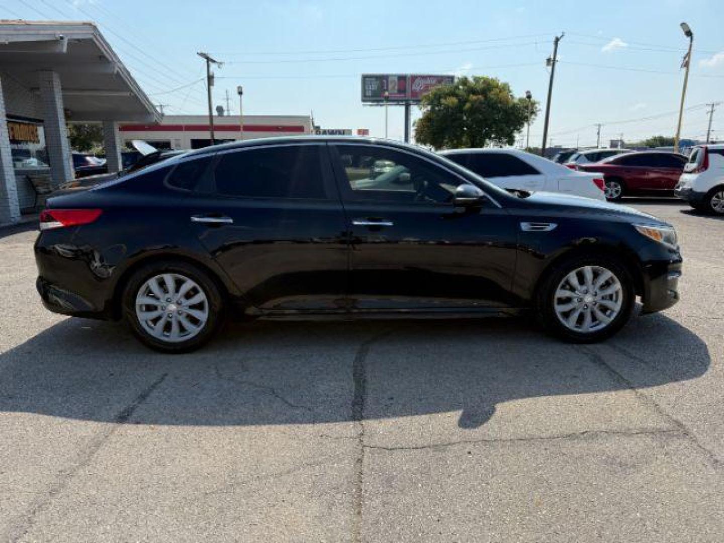 2016 BLACK Kia Optima LX (5XXGT4L35GG) with an Theta II 2.4L I-4 ga engine, located at 2715 W Pioneer Pkwy, Arlington, TX, 76013, (817) 265-9009, 32.710262, -97.153236 - Photo#5